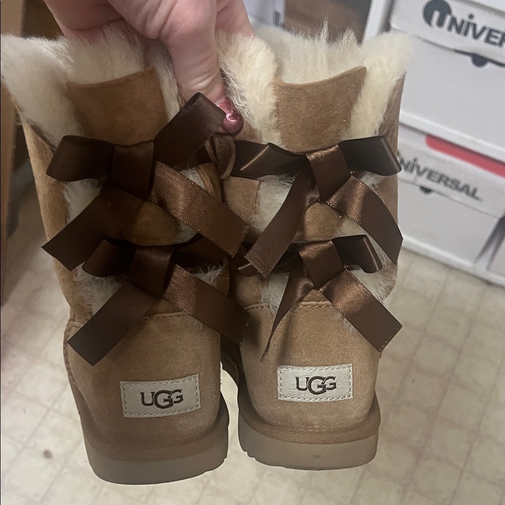 UGG Women's Brown Shearling Ribbon Boots size 8. Only work once